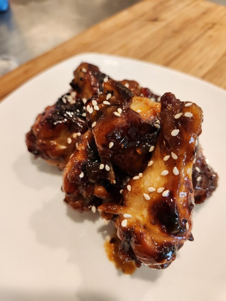 Triple cooked chicken wings with tangy chili sauce