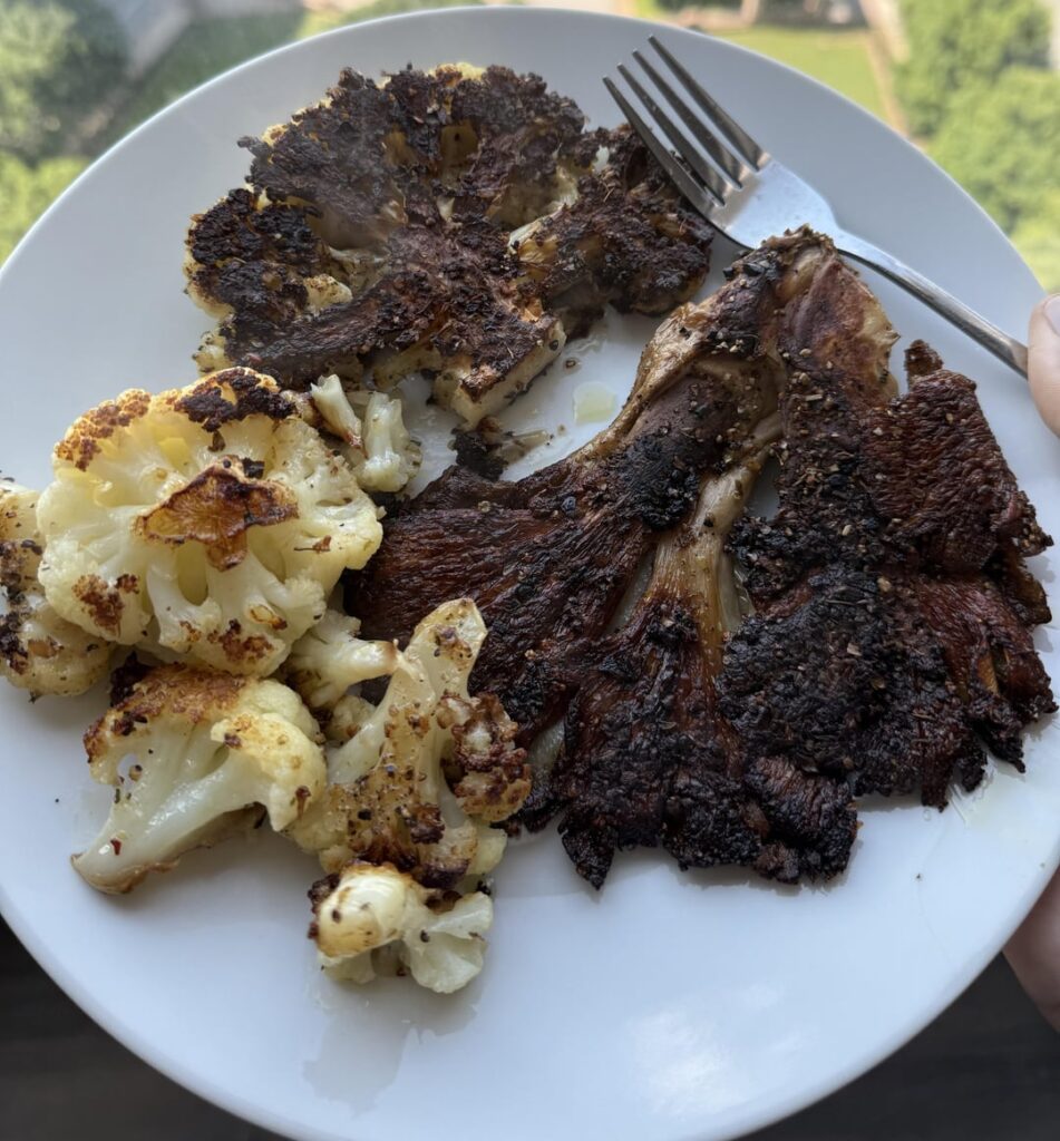 Oyster mushroom steak, cauliflower steak, cauliflower bites. Kale salad with Follow Your Heart Caesar dressing and Parmesan