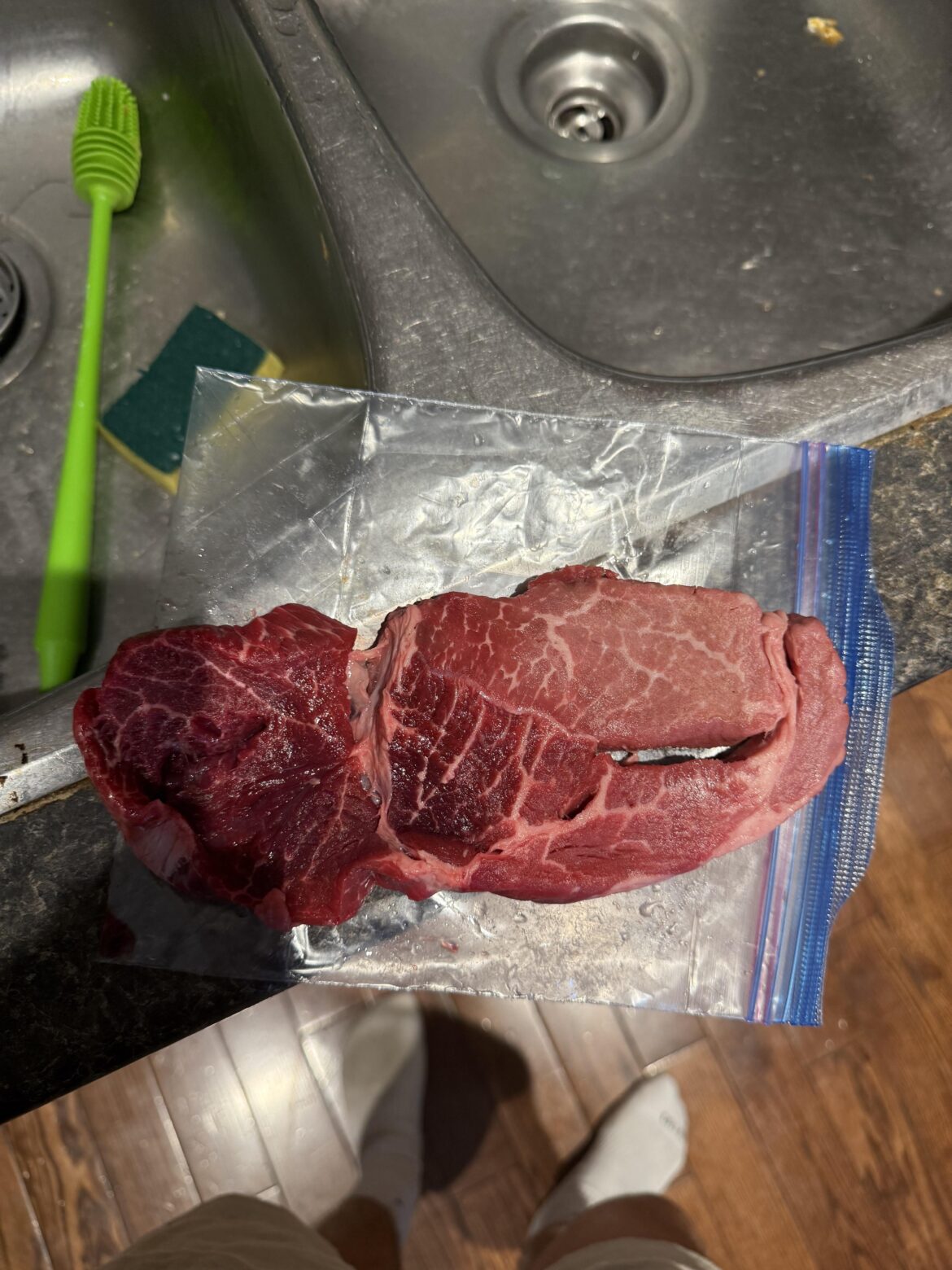 Dark red is soft and mushy and then it’s pink and firmer. What does this mean? Smells okay. Is it okay to cook