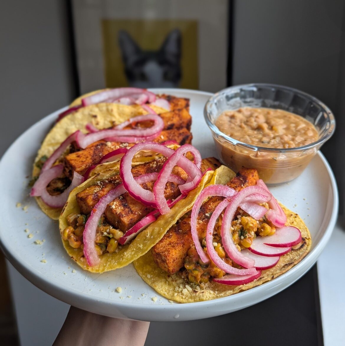 grilled tofu and street corn tacos with refried beans.