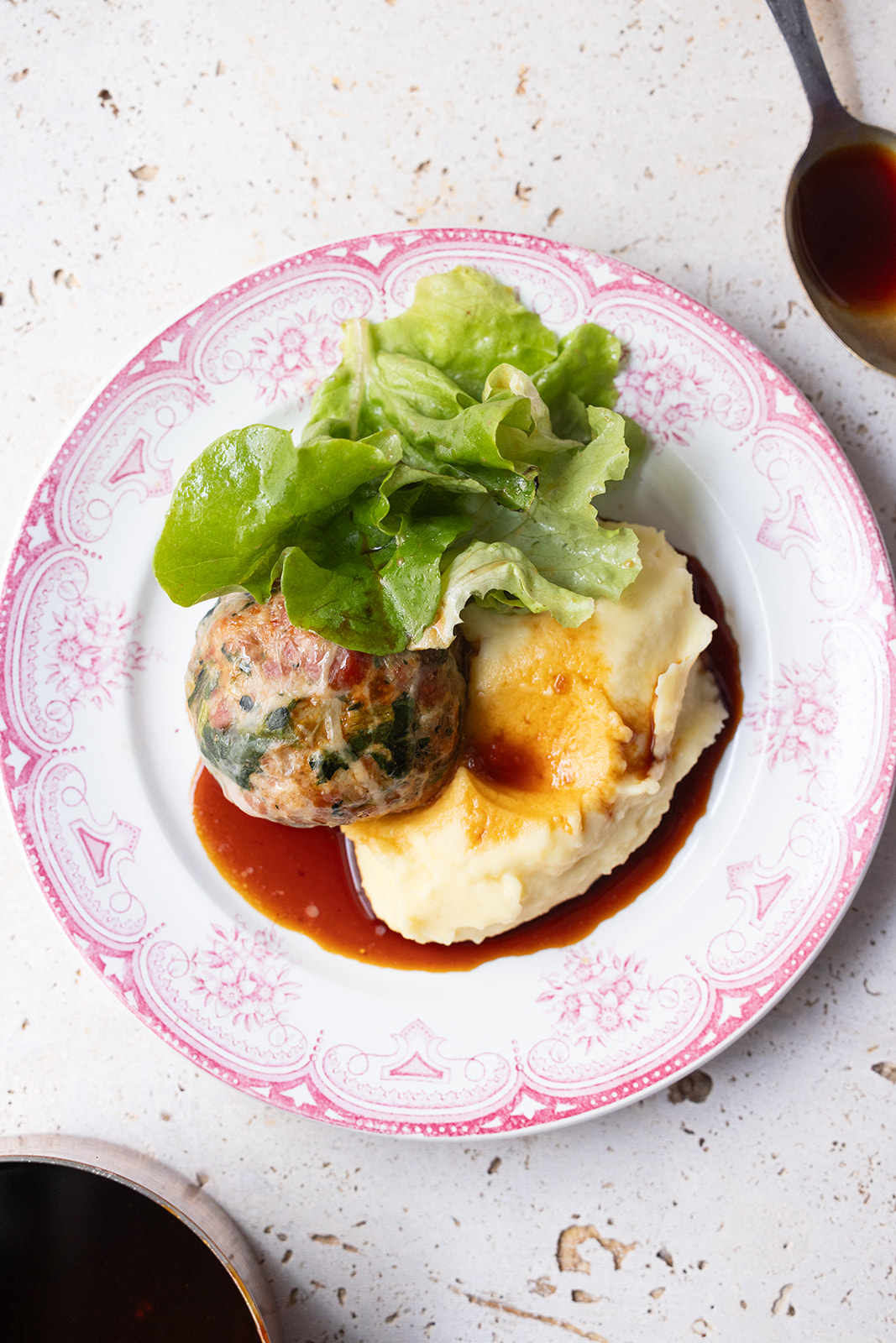 Chef Laetitia Visse's meatball dish with mashed potatoes and salad.