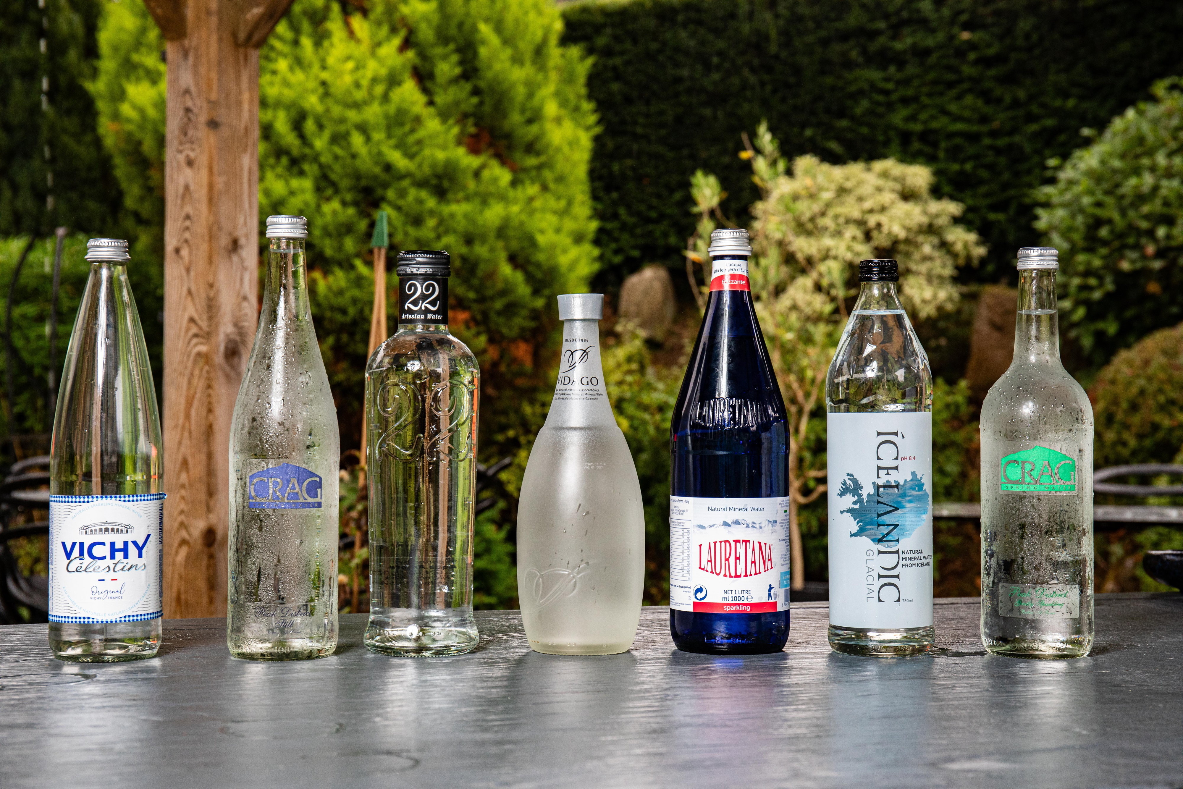 Several bottles of water from a Michelin-star restaurant's bottled water menu.