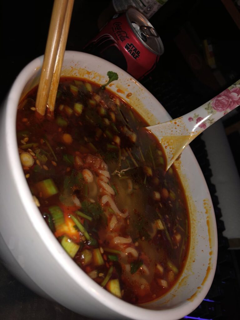 Buldak x2, 4 fresh thai chilis, a spoonful of chili crisp with chicken and onion and cilantro, perfect hangover remedy