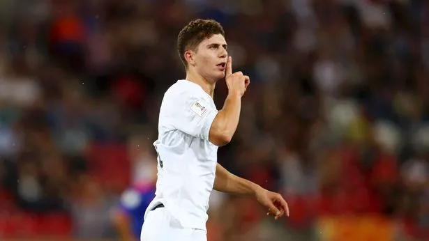 New Zealand international Liberato Cocace shushes Colombia's goalkeeper