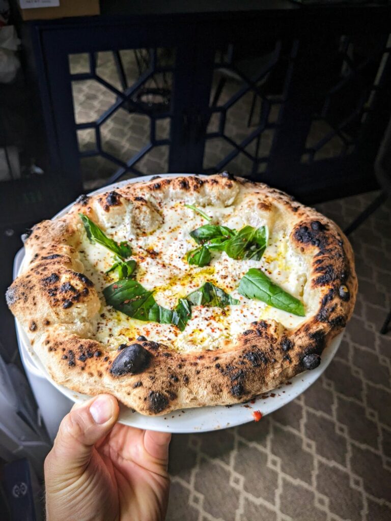 72% hydration Pizza baked in 86 seconds in my wood fired oven.