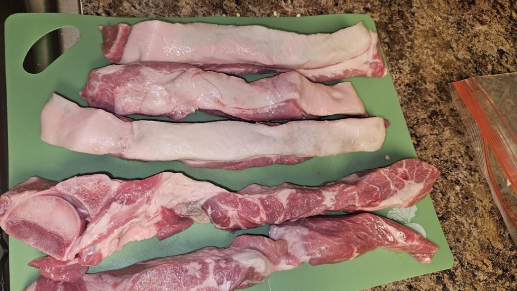 Grey/green on pork ribs’ fat before best used by date? Grey/green on pork ribs' fat before best used by date?