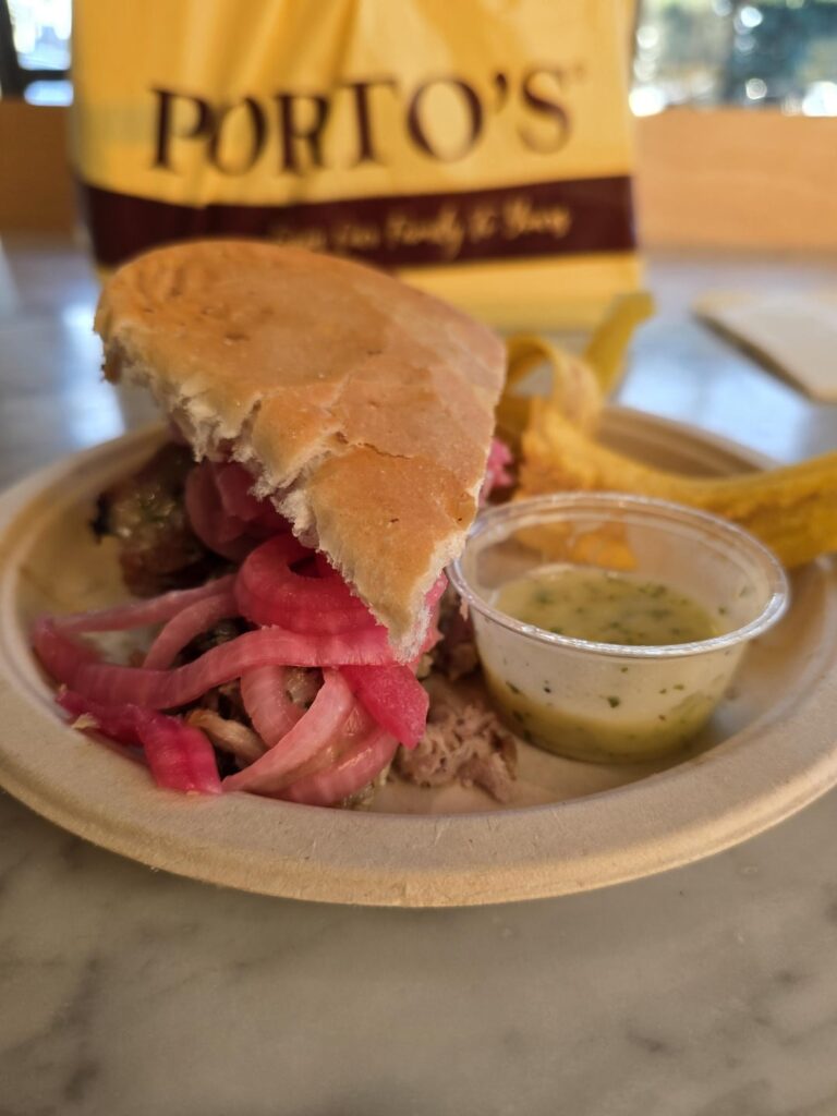 Pan con Lechon with extra pickled onions (bonus) extra garlic mojo