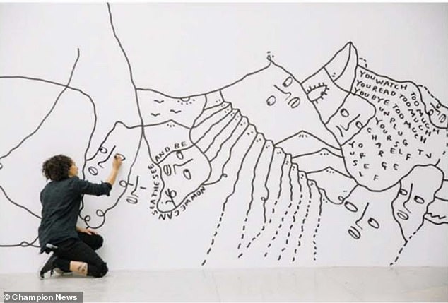 Ms Martin's is seen here working on one of her distinctive black and white murals. Her designs have seen her gain international recognition, with lucrative collaborations involving singer Kendrick Lamar and labels Tiffany & Co, Adidas and Puma