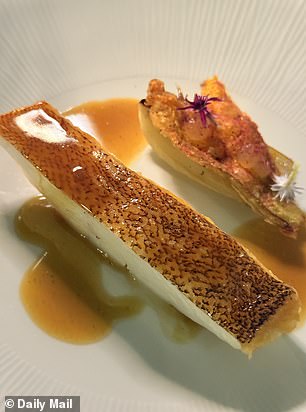 The coral trout with orange fennel, anise butter glaze and zucchini flower fritter