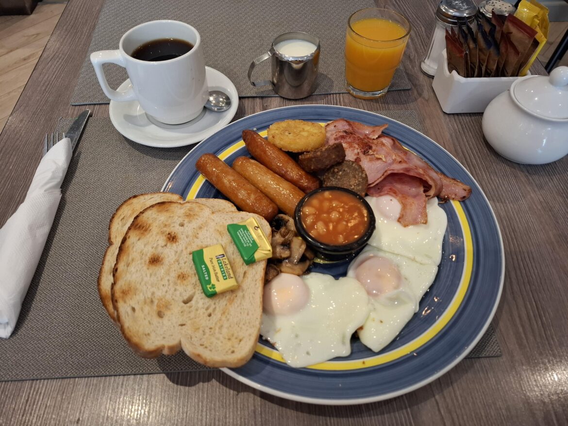 Arthur's Cafe and Restaurant, 14.95 Euros, "large" breakfast with 3 sausages 3 eggs 3 bacon 2 white pudding, price includes tea/coffee and juice. Navan, Co.Meath, Ireland