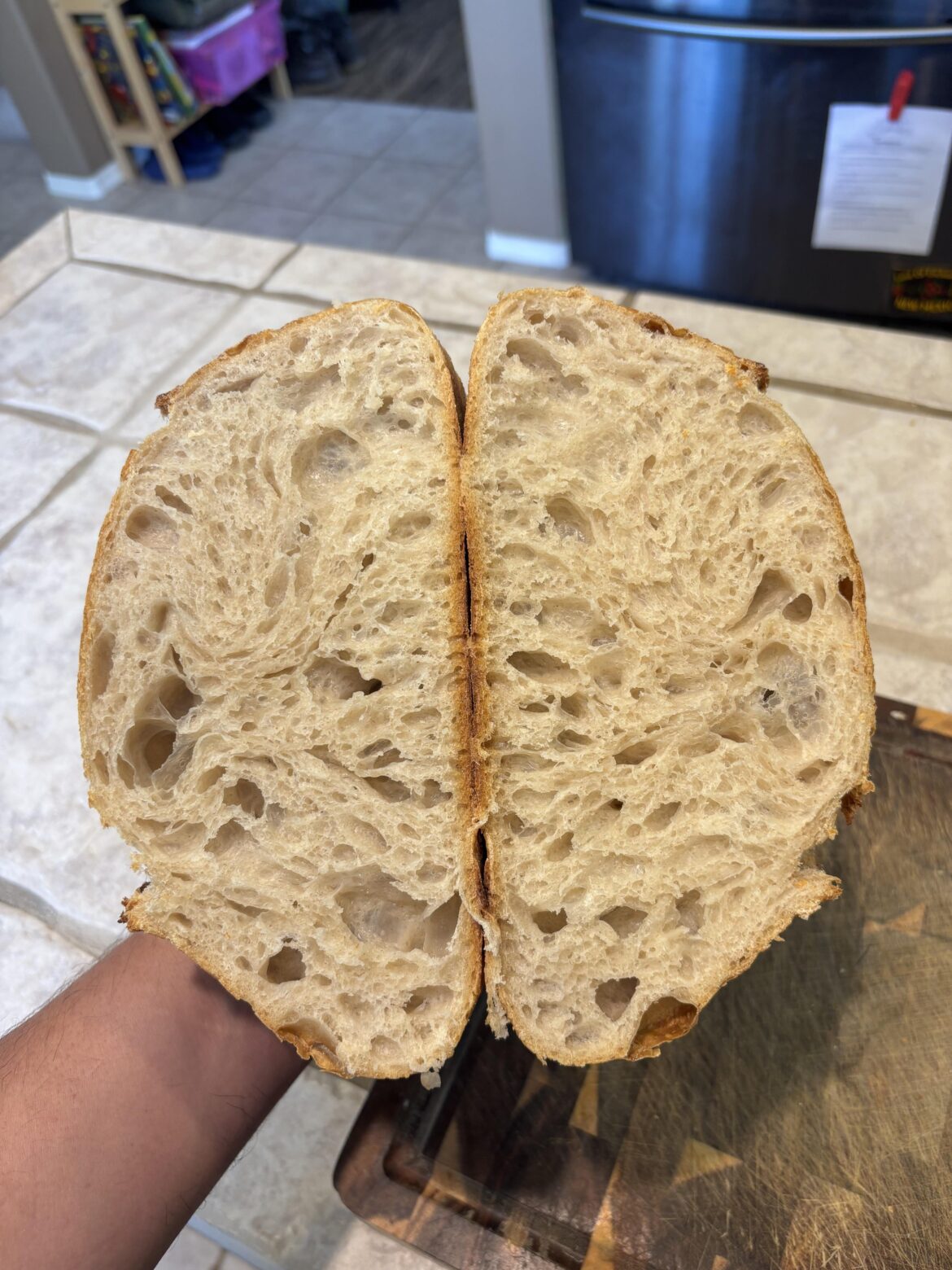Around 90% hydration with 10% whole wheat.