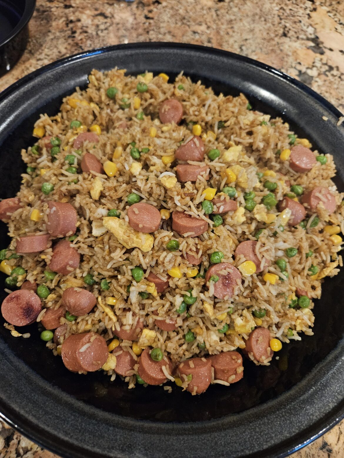 My grandmother used to make fried rice with hot dogs. Made this tonight in her honor.
