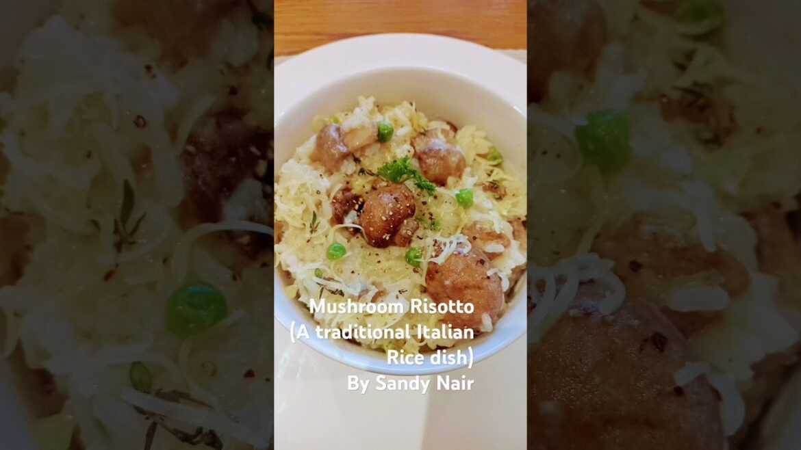 MUSHROOM RISOTTO.Italian sticky rice dish cooked in broth with mushrooms,herbs,topped with Parmesan.