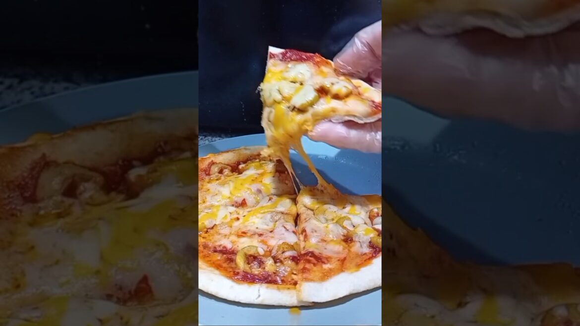 Arabic bread ( kubz ) turns to delicious pizza .. #arabicfoodrecipe #arabicbread #pizzarecipe