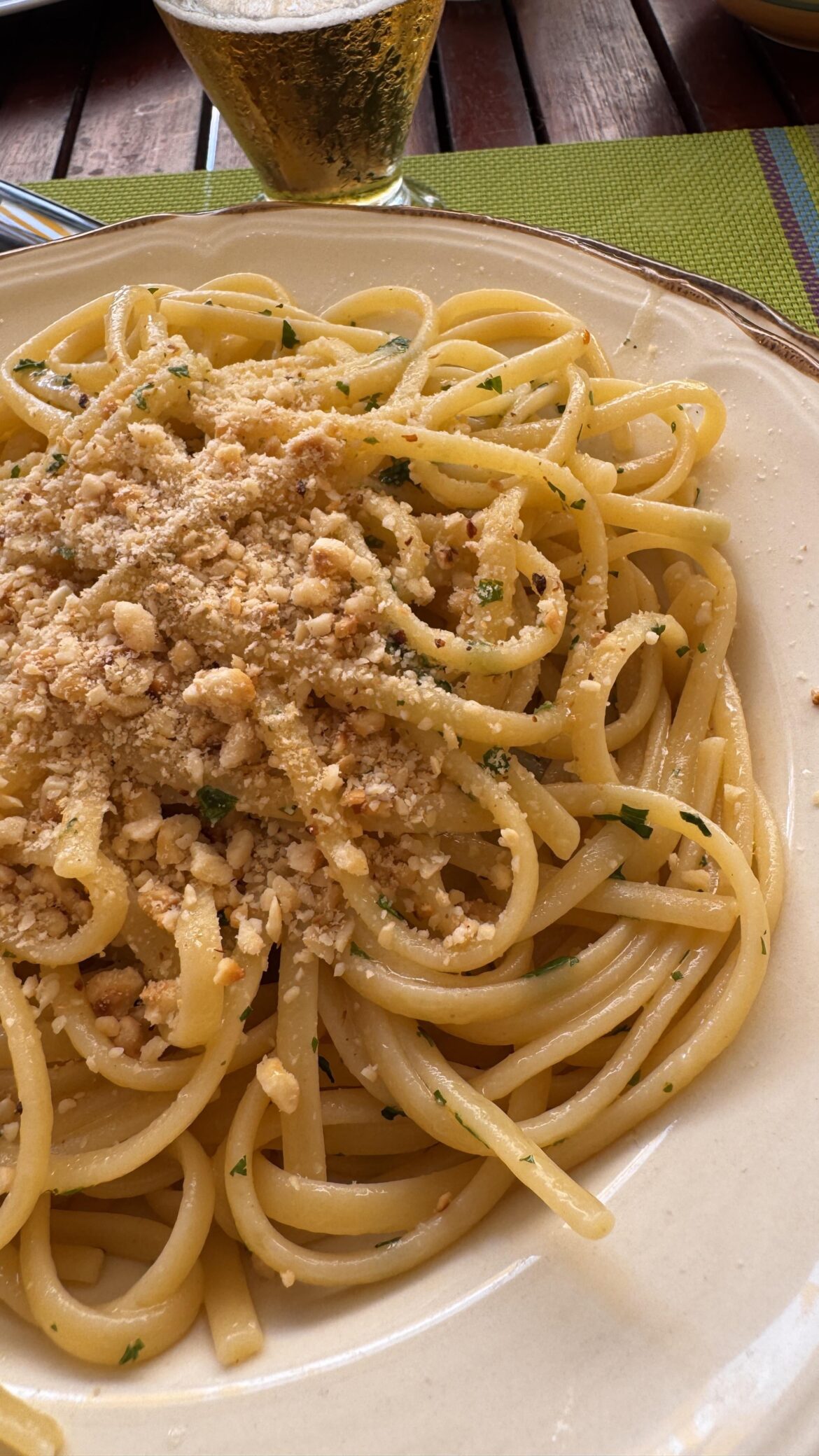 Linguine con colatura di alici, lemon zest and hazelnuts crumble