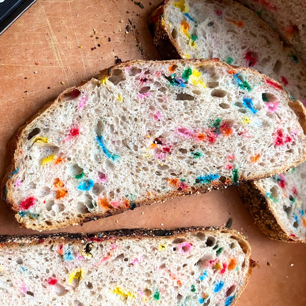 slice of funfetti sourdough on a cutting board