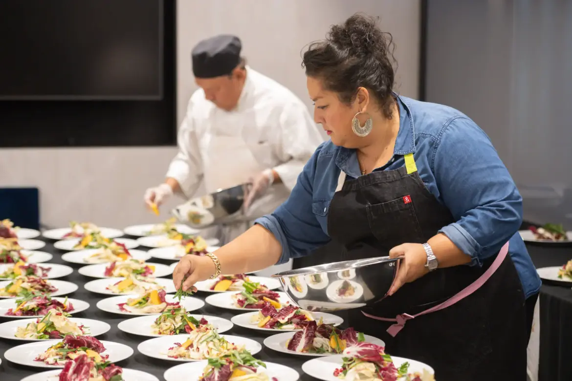 Ayesha Nurdjaja attends a dinner hosted by Ayesha Nurdjaja and Michael Symon as part of the Food Network New York City Wine &amp; Food Festival presented by Capital One (Image via Getty).