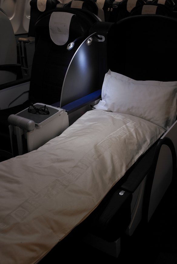 Seats convert to a flat bed.