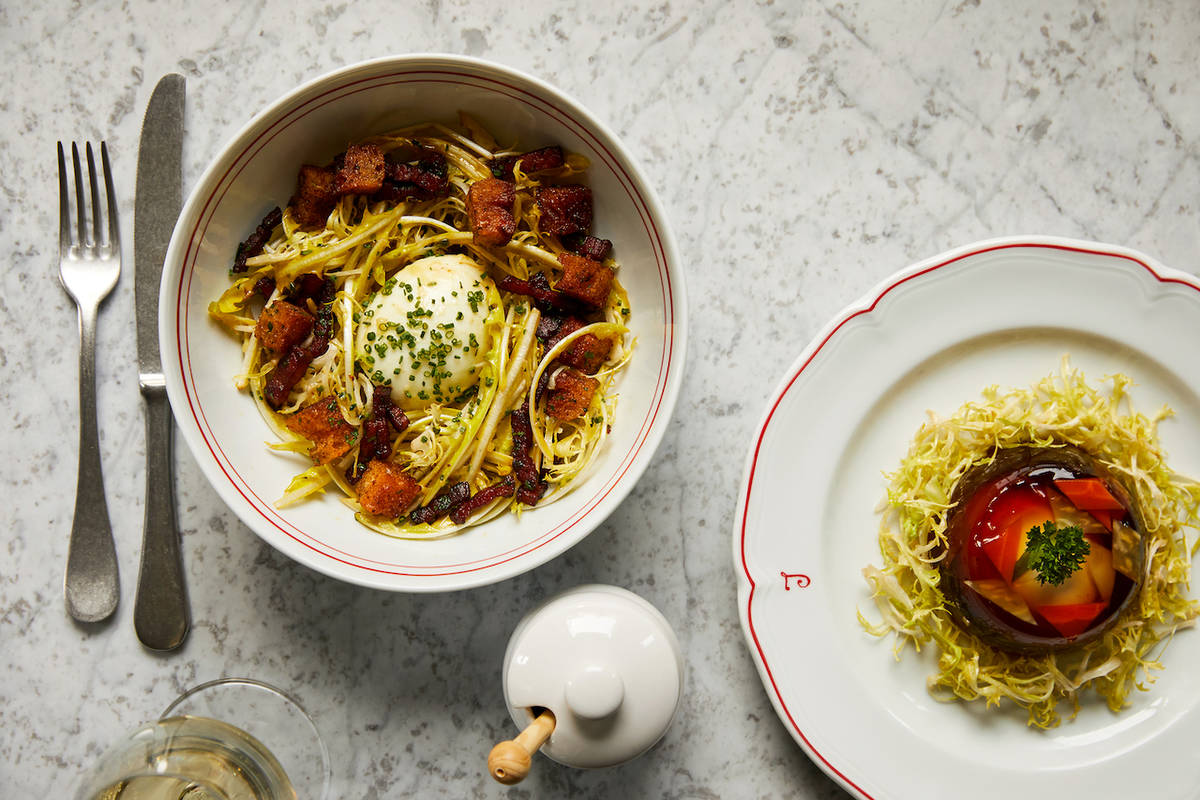 two bowls on a table filled with pasta and red salad at Josephine French bistro
