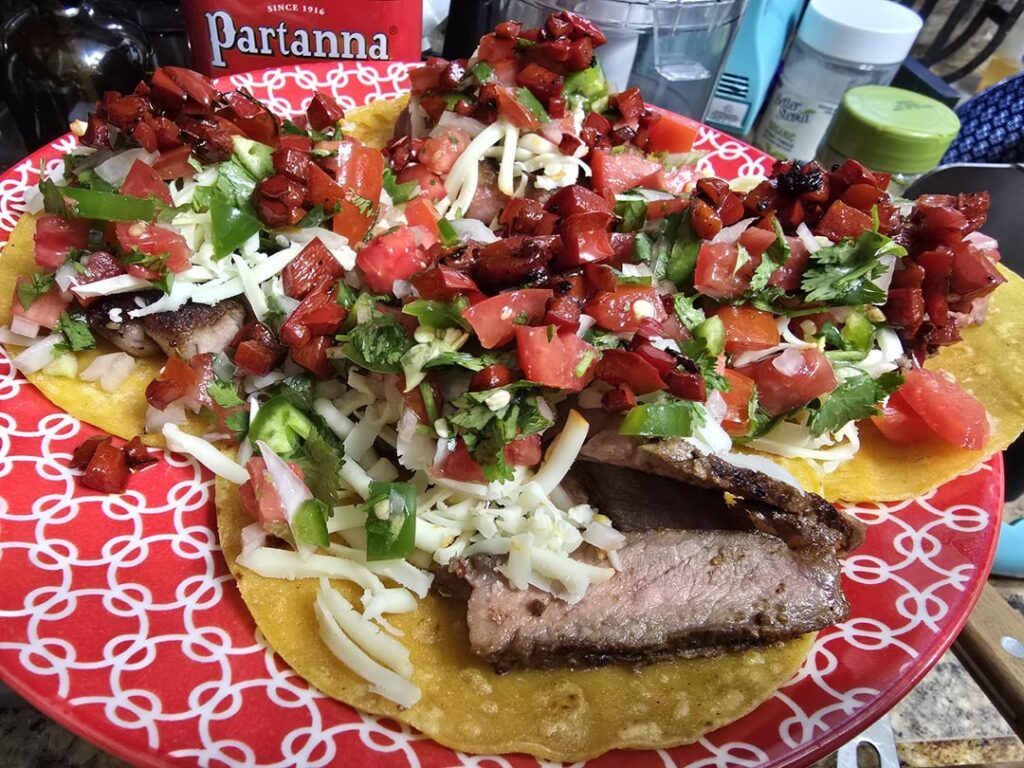 Steak tacos with grilled red pepper, homemade pico and Munster cheese