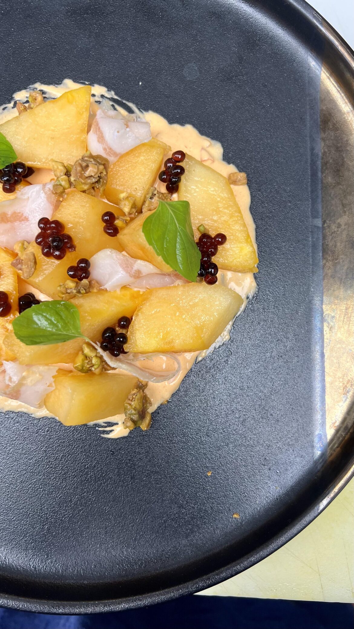 Orange watermelon, guanciale, Calabrian chili whipped provolone, candied pistachio, Nepitella mint, balsamic pearls