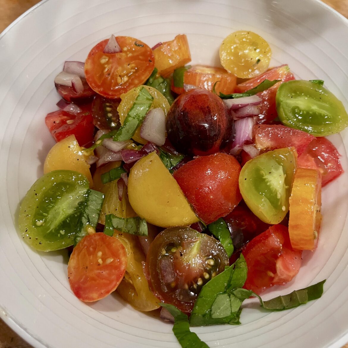 Very simple tomato salad—but these homegrown tomatoes are so pretty and delicious, they don’t need anything else!