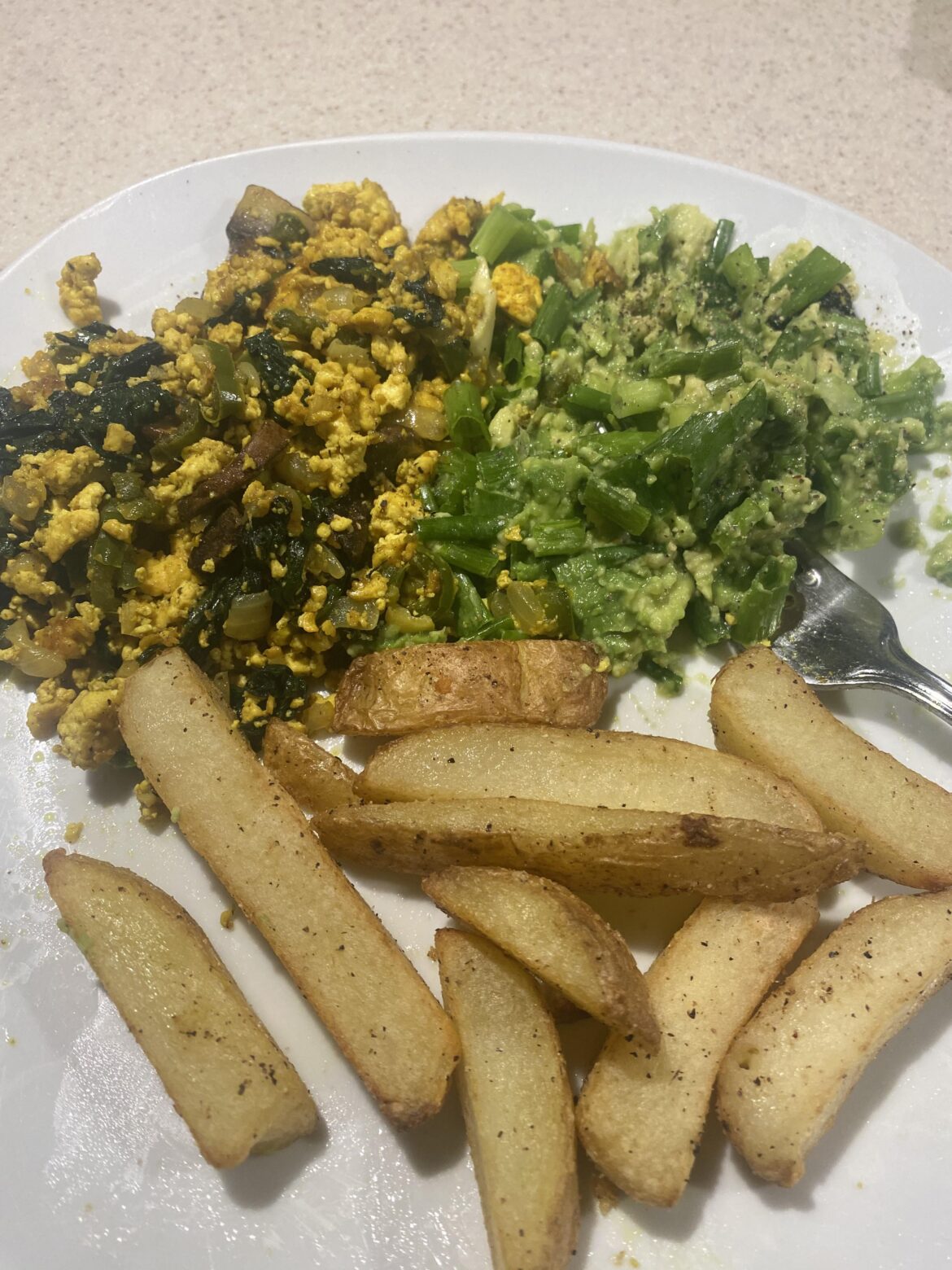 tofu scramble with home fries and a side of mashed avocado/green onion 🔥 🌱 💪
