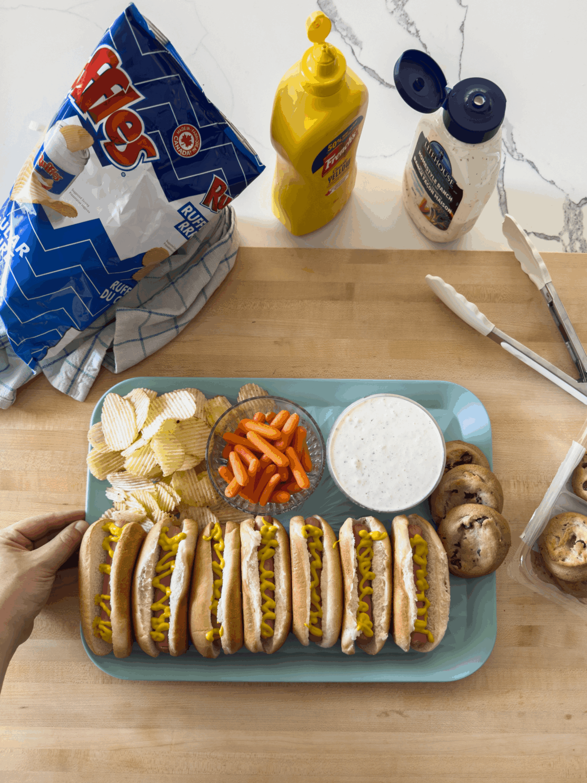 [homemade] 7 hot dogs, chips, carrots, ranch dip, and chocolate chip cookies