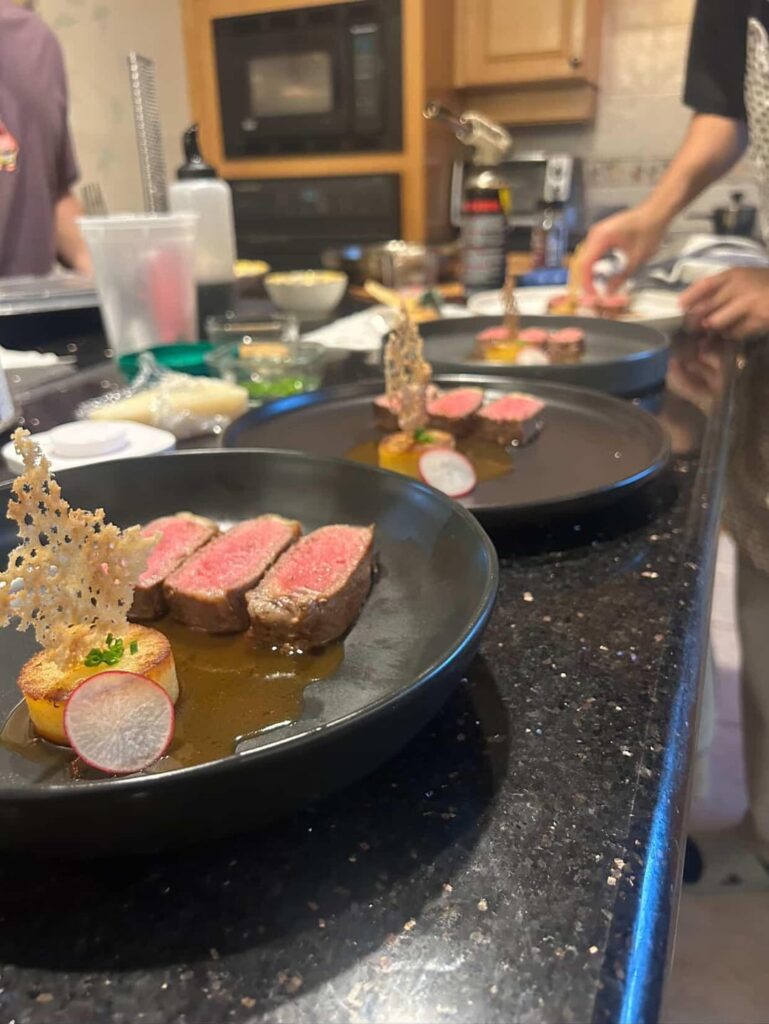 NY strip with fondant potatoes and demi glace.