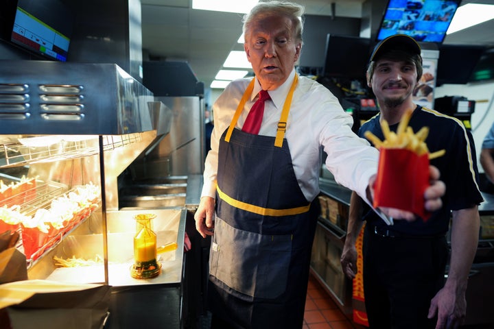 Donald Trump worked behind the counter serving fries during a campaign event at McDonald's on Oct. 20, 2024, in Feasterville-Trevose, Pennsylvania.