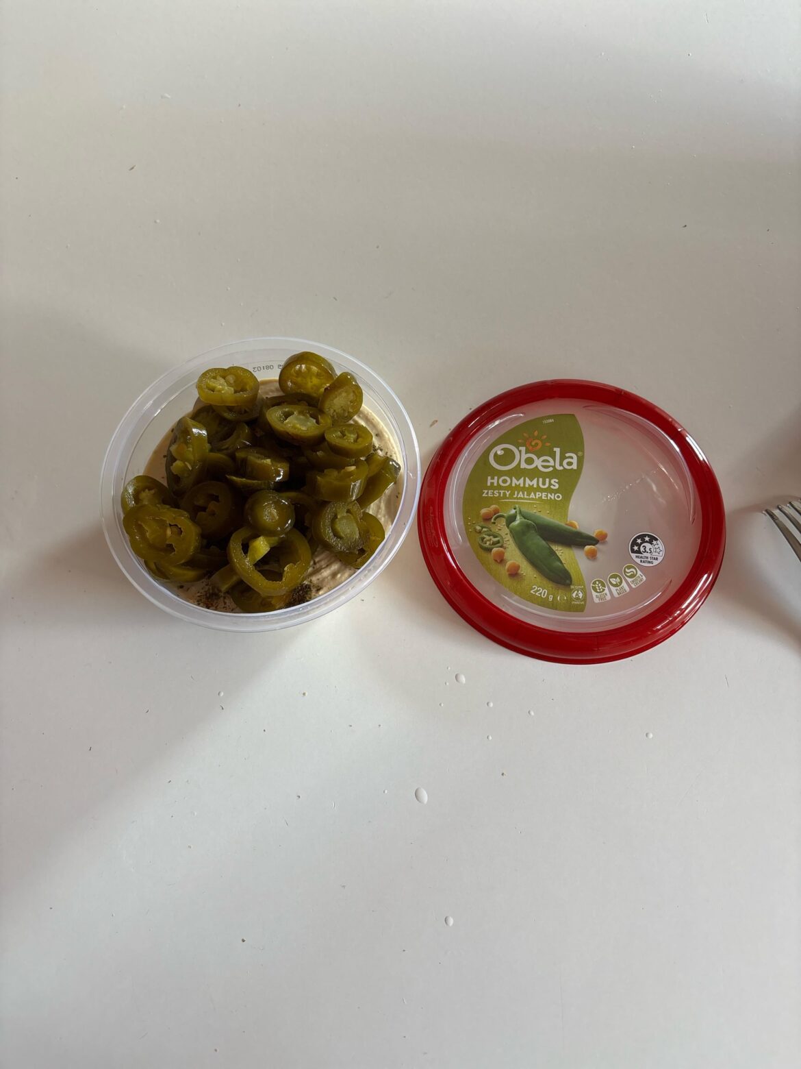 Just adding a few extra jalapeños to my hummus