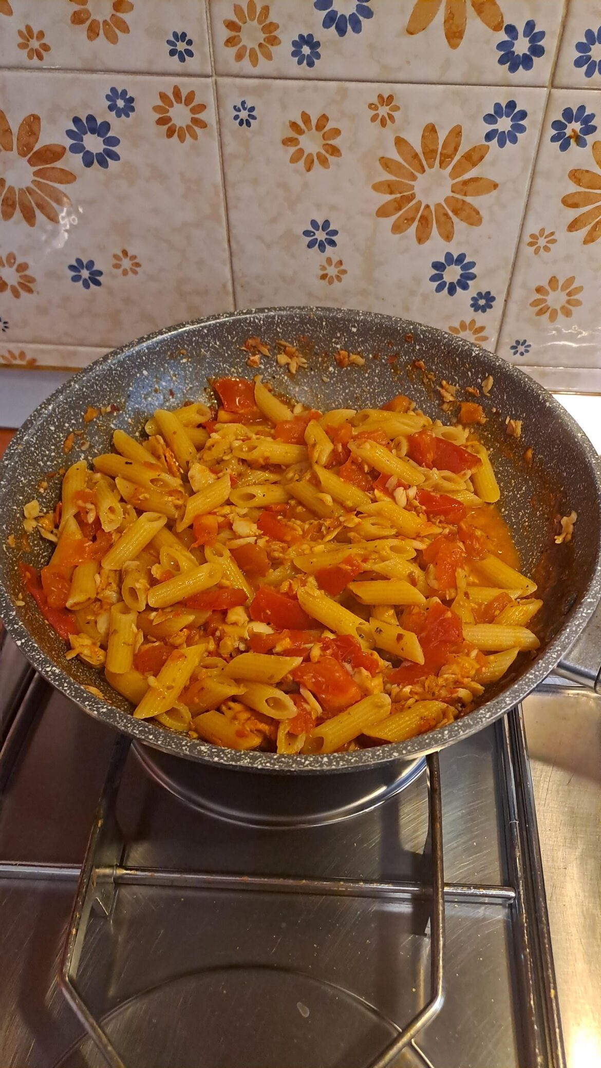 Pasta with fresh tomato and cod