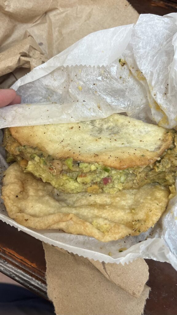 Doubles, Bake and Saltfish, and Oxtail Roti from A&A Bake Doubles and Roti in Bed-Stuy, Brooklyn