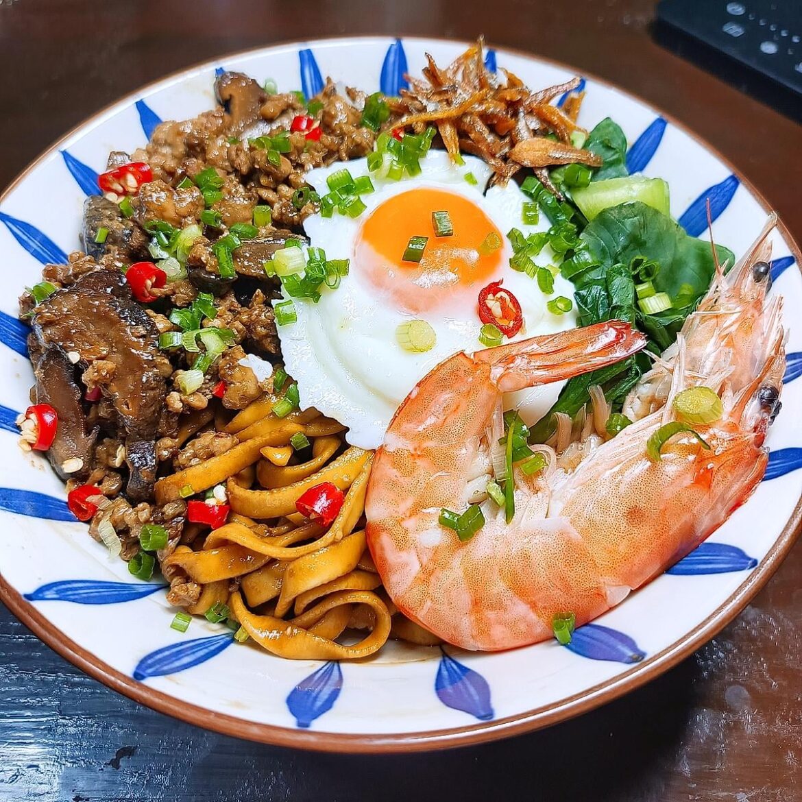 Handmade noodles with minced pork and mushroom sauce, topped with a poached egg 🤤❤️