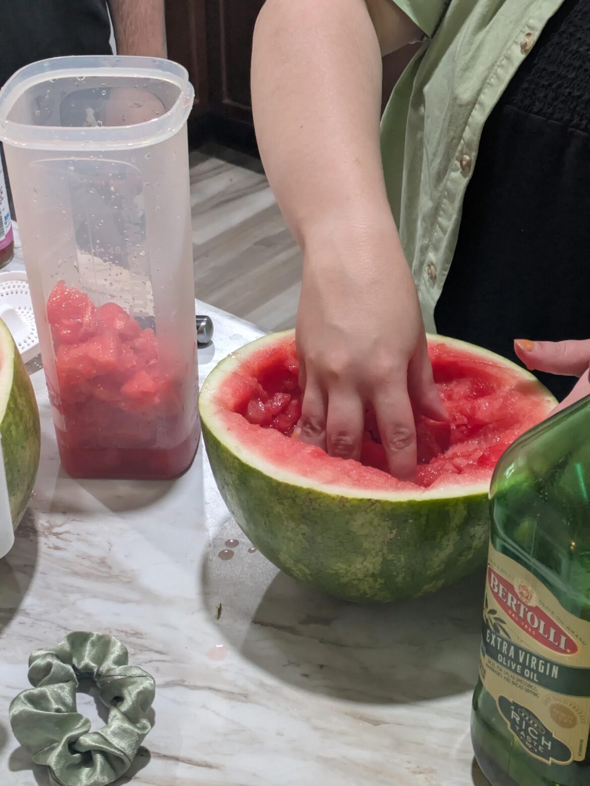 Roommate using "fisting method" on watermelon