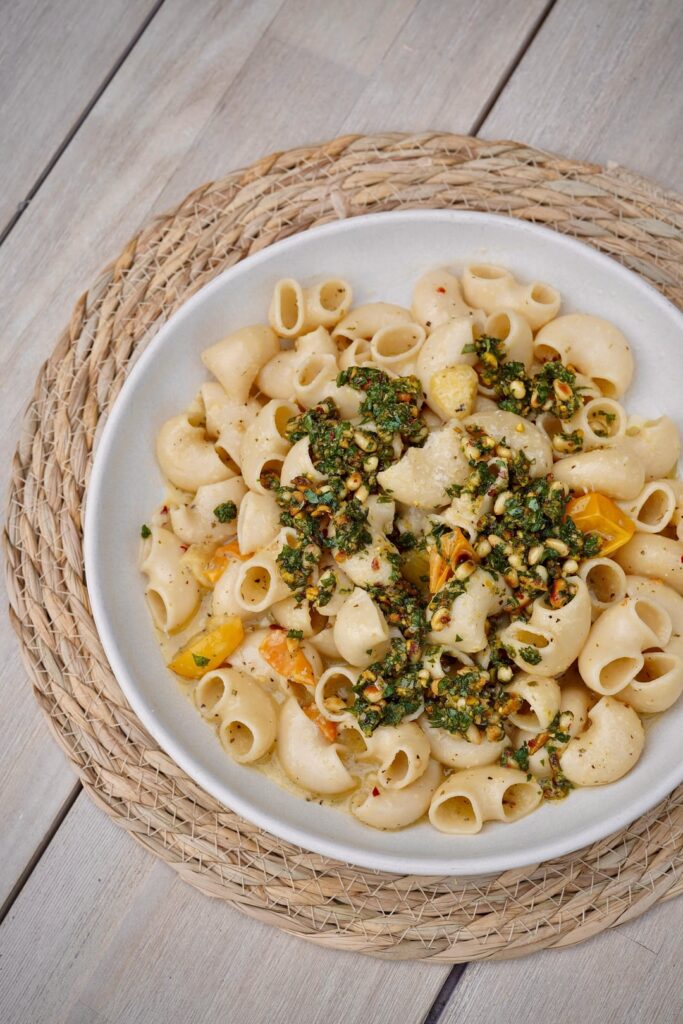 Canestri with Sun Gold tomato sauce, and pistachio & pine nut gremolata. Canestri with Sun Gold tomato sauce, and pistachio & pine nut gremolata.