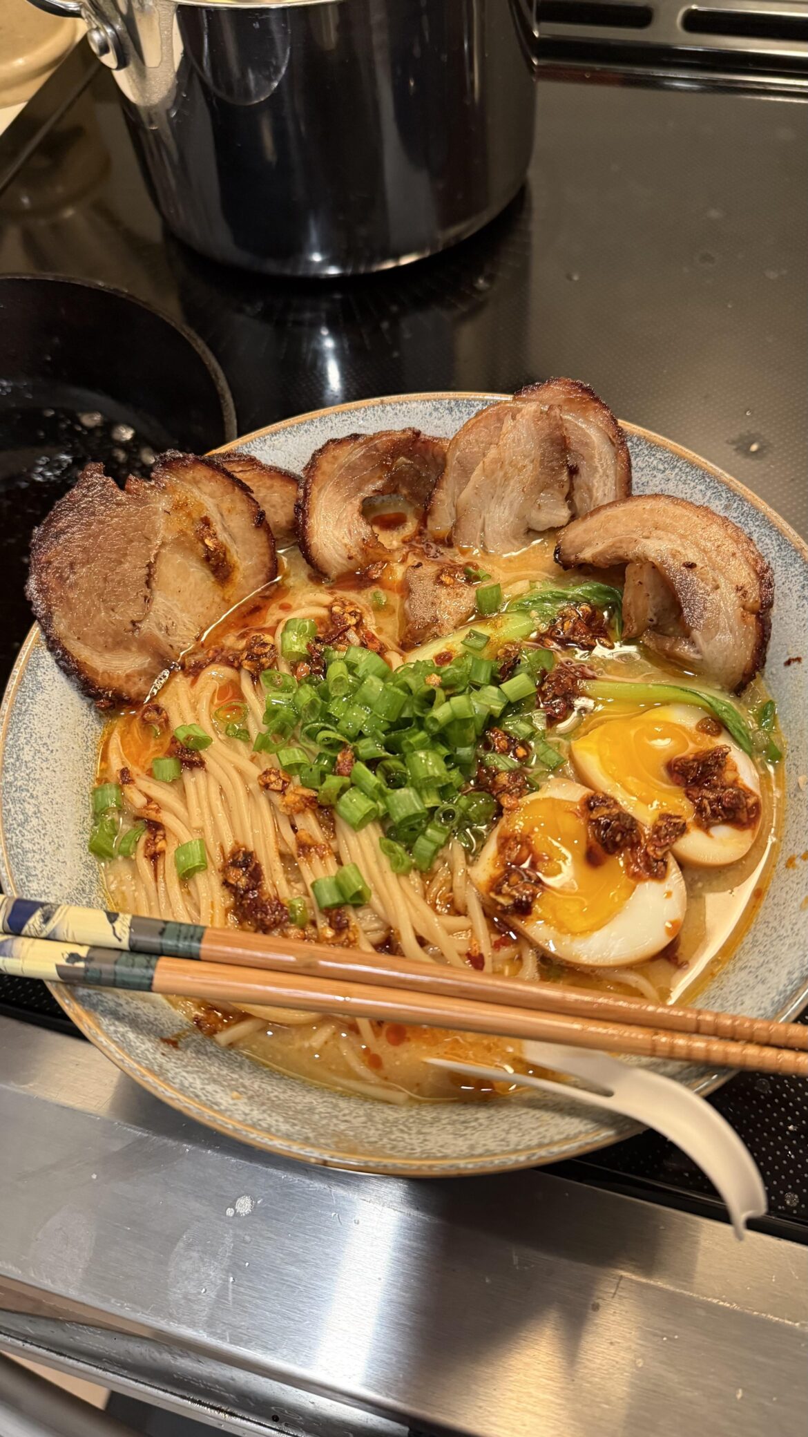 I like to sear my chashu a little before adding