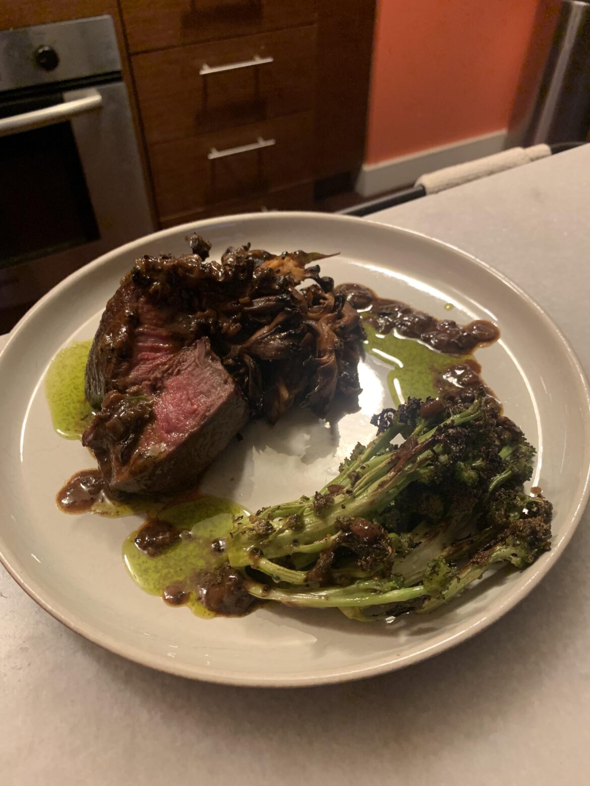 Tenderloin 129 for 1 hour with a red wine mushroom sauce, brocollini and a tarragon oil. Was having a little trouble with the tarragon oil plating.