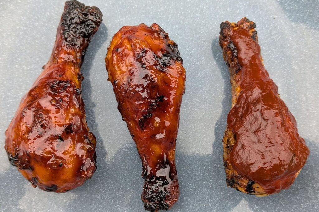 Grilled BBQ & Blue Agave Sriracha hot sauce tossed chicken drumsticks