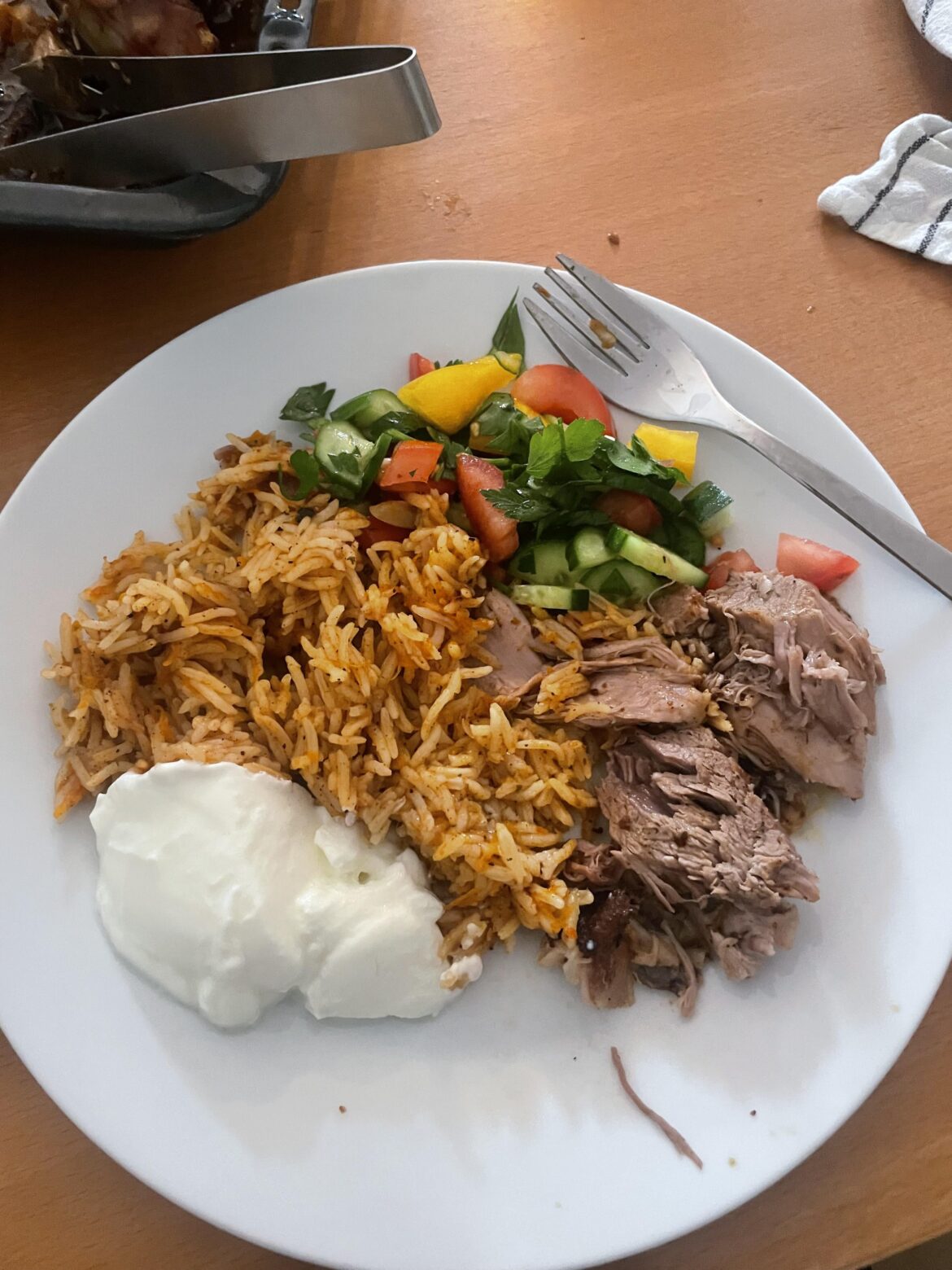 Lamb, rice, salad, and yogurt