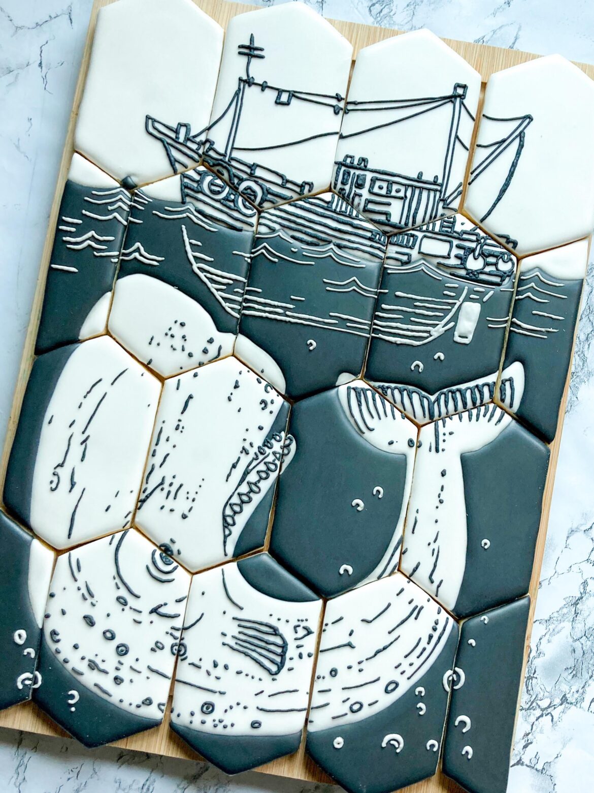 Moby dick cookies for a friend’s birthday. I’ve always wanted to try this “puzzle” style!