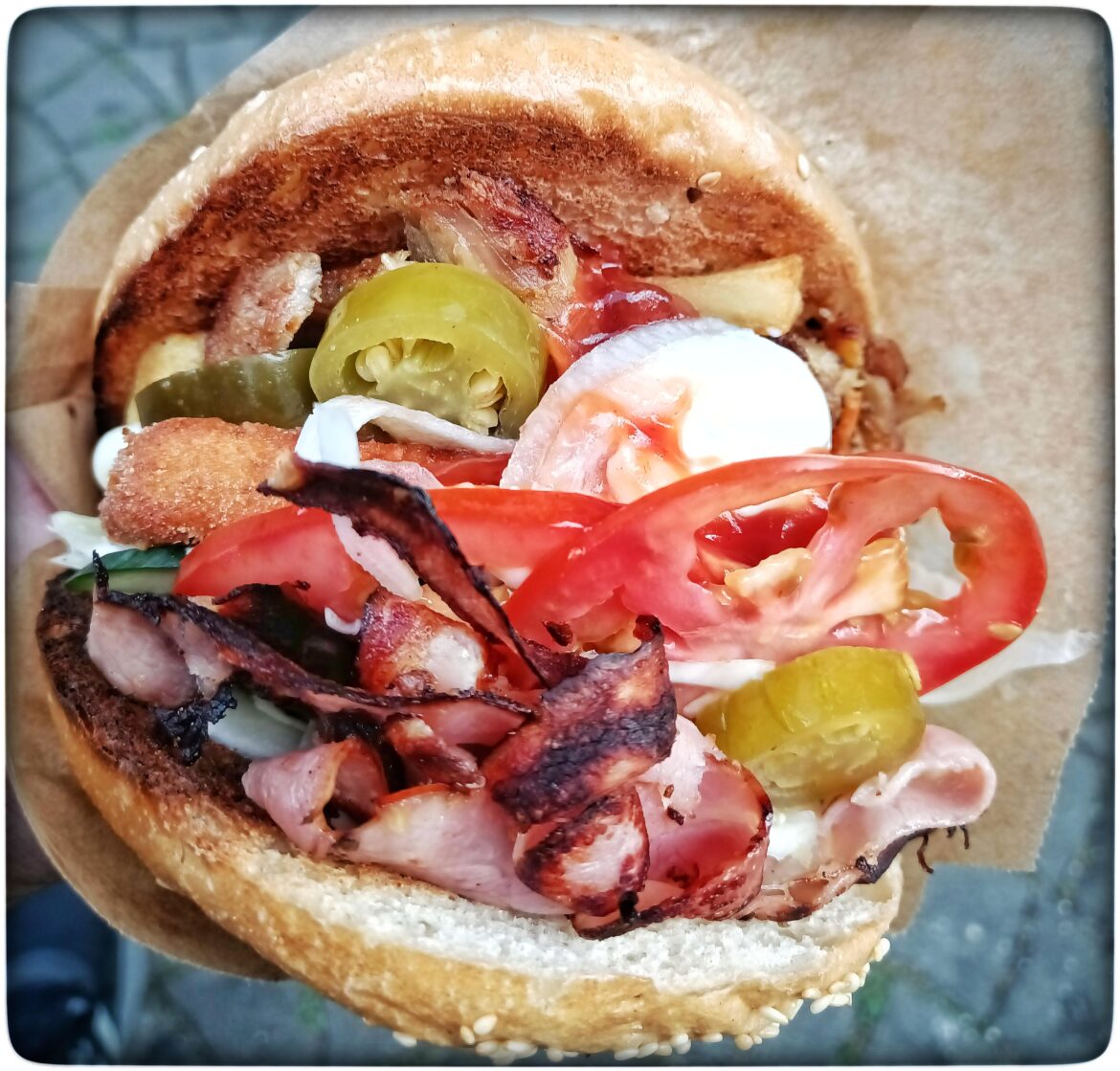 Hamburger with gyros meat, fried cheese, grilled bacon, jalapeños and tartar sauce. City of Ostrava