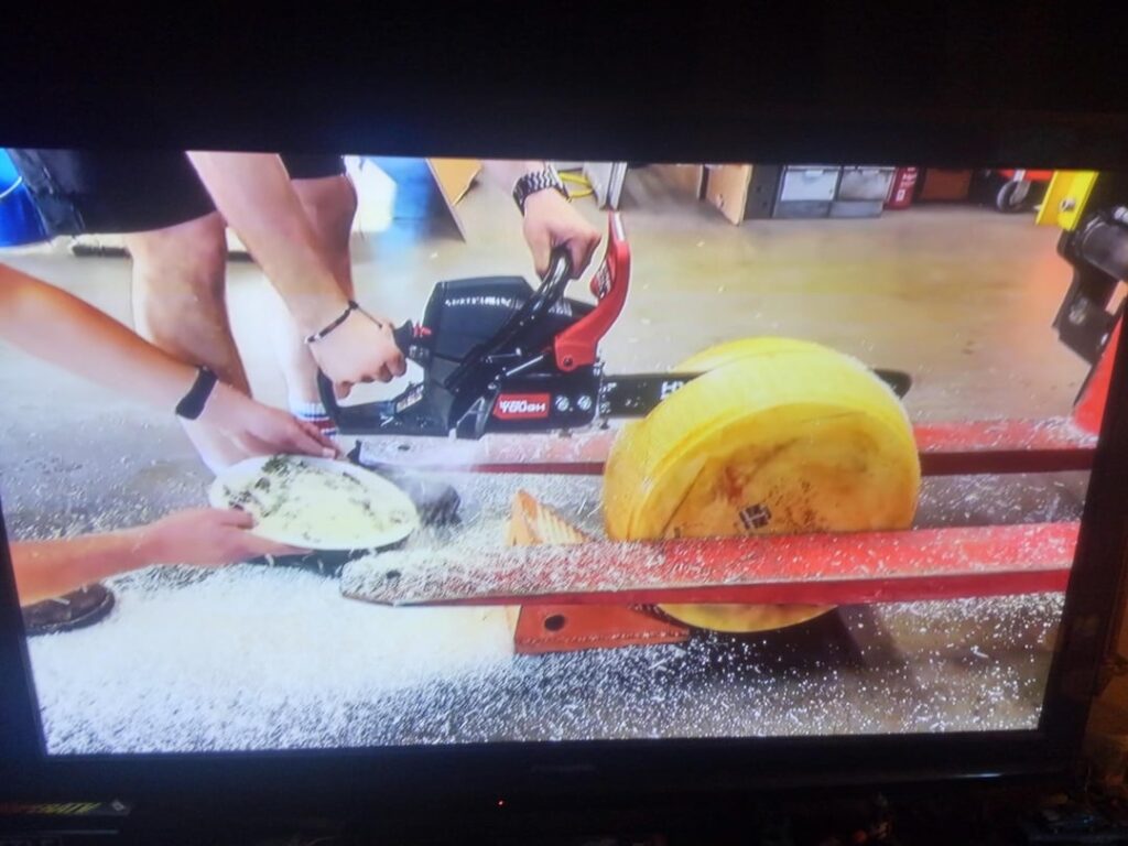 The only good way to cut a cheese wheel in half