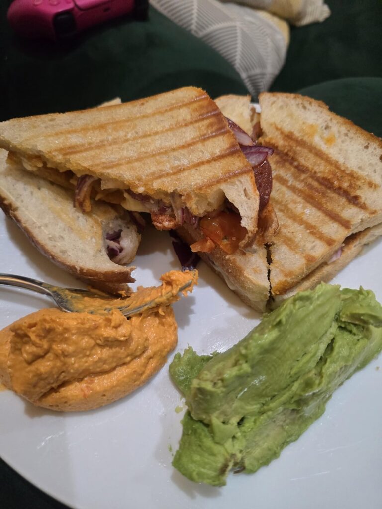 Chorizo, Red Onion and Cheddar, Sourdough Toastie with Tomatoes and Bhut Jolokia Jam, hummus and avocado