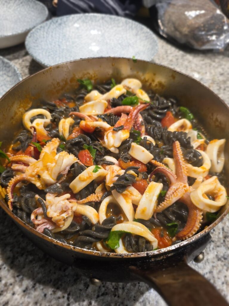 Squid ink pasta with calamari.
