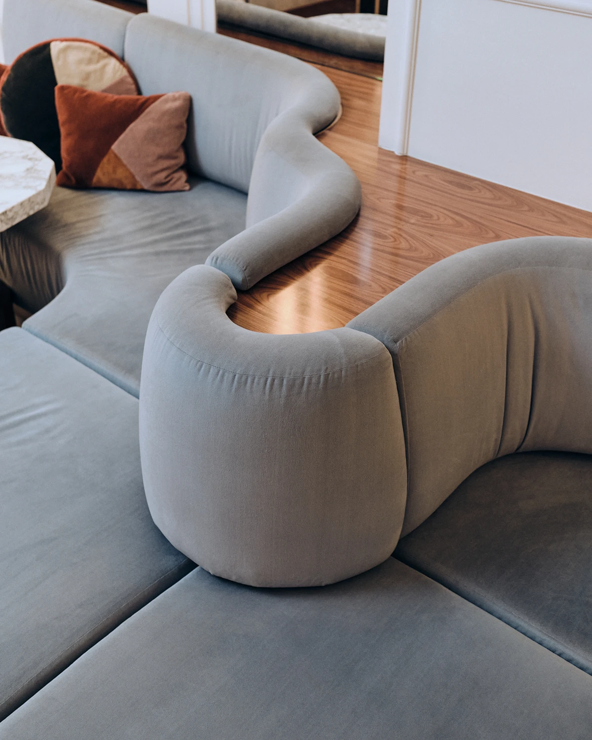 A sleek, sculptural sofa that blends comfort and contemporary design in W Rome’s lounge