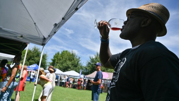 David Johnson, a Charles County resident, samples a wine from a vendor during the Arts, Wine, Jazz & Soul Festival in Havre de Grace on Saturday. Proceeds from the event benefit the Havre de Grace Colored School Foundation. (Brian Krista/Staff)