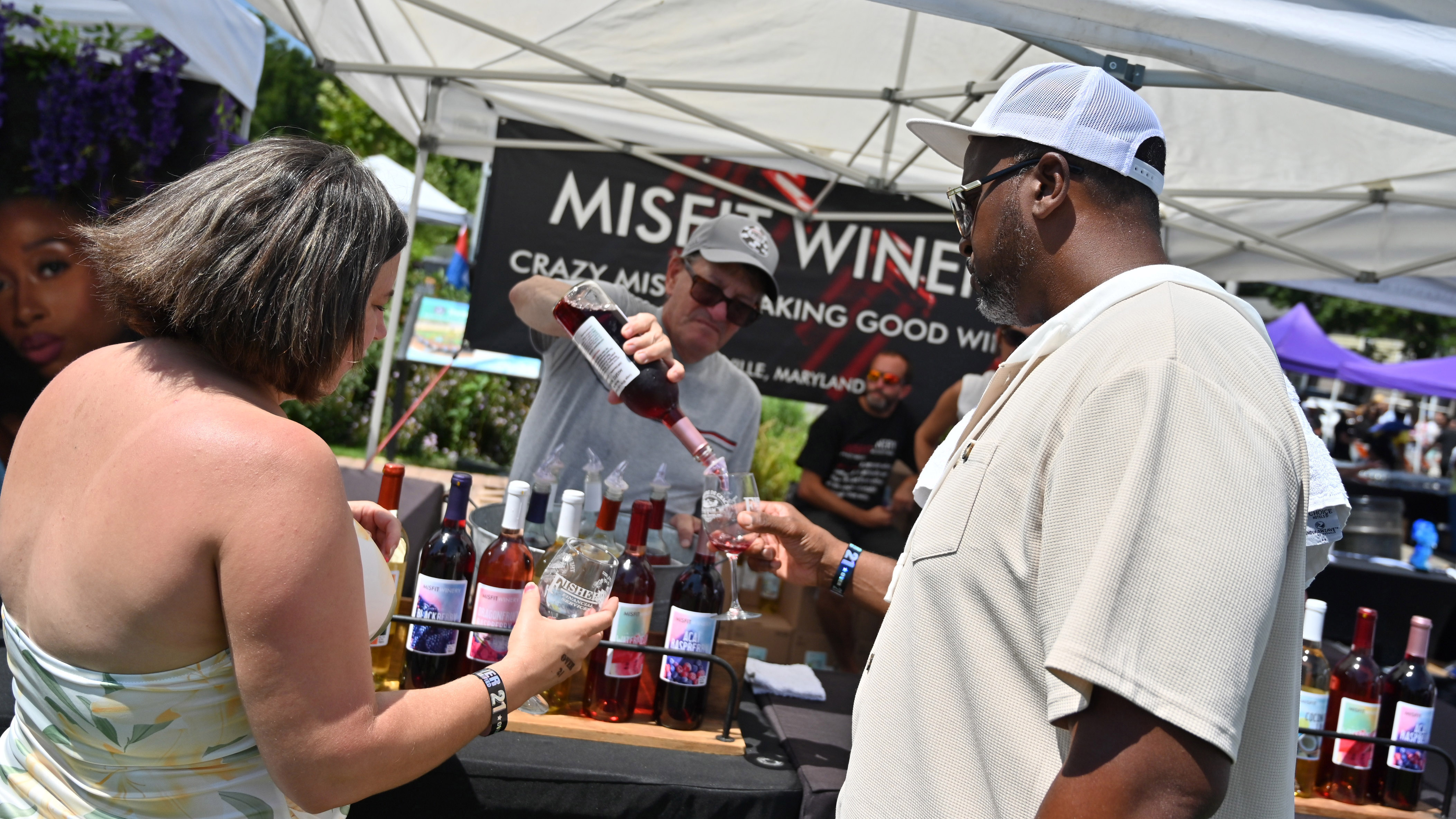 Edgewood residents Stacy Yearby, left, and Lamot sample wines from Misfit Winery during the Arts, Wine Jazz & Soul Festival in Havre de Grace on Saturday. Proceeds from the event benefit the Havre de Grace Colored School Foundation. (Brian Krista/Staff)