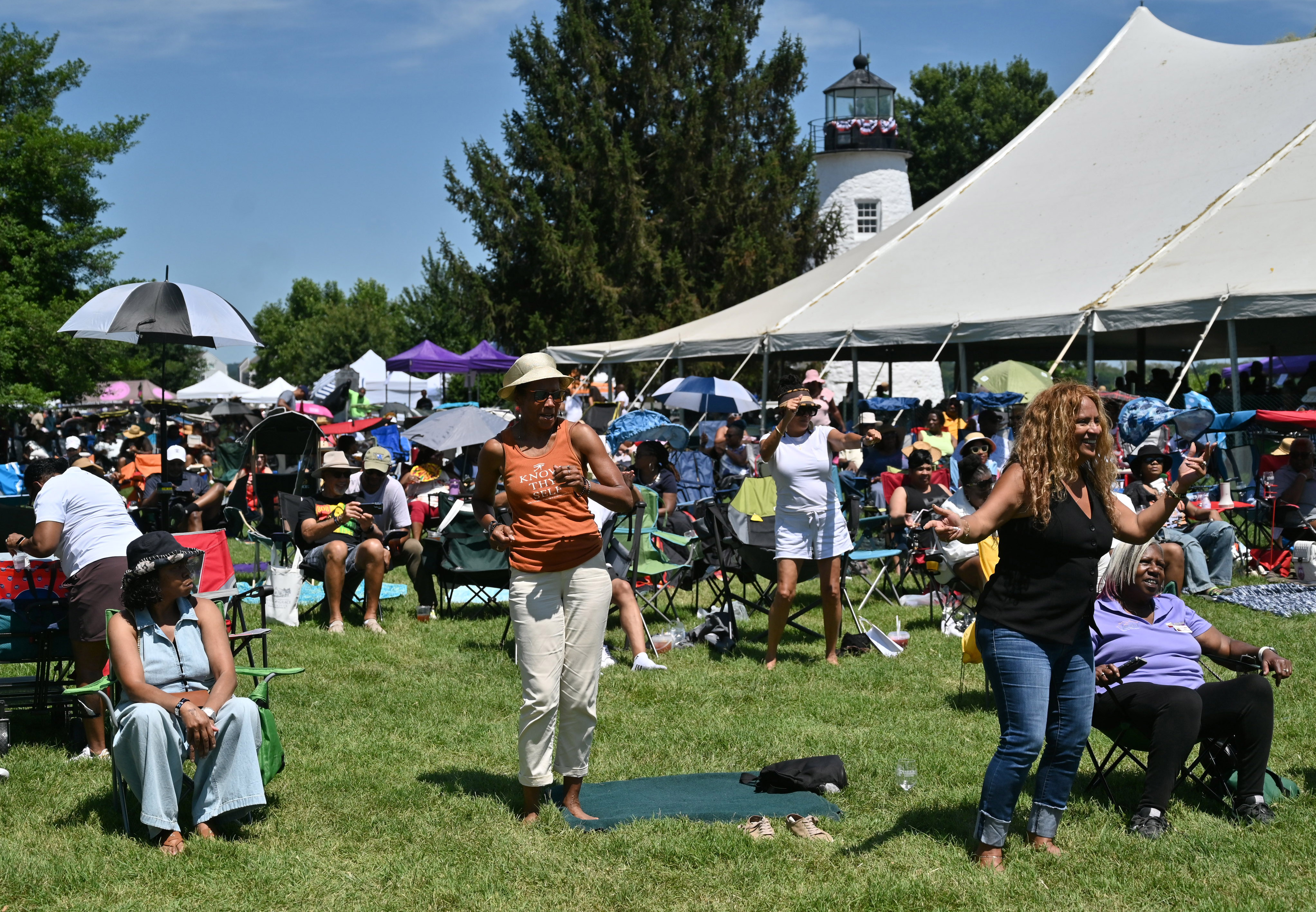 Antendees dance to a musical performance during the Arts, Wine Jazz & Soul Festival in Havre de Grace on Saturday. Proceeds from the event benefit the Havre de Grace Colored School Foundation. (Brian Krista/Staff)