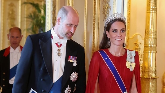 Britain's Prince William, and Kate, Princess of Wales attend the State Banquet at Windsor Castle in Windsor, England, Tuesday, July 8, 2025. Kate looked stunning in a flowing crimson gown, paying homage to Princess Diana's famous tiara.(AP)